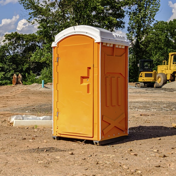 how often are the portable restrooms cleaned and serviced during a rental period in Warfield KY